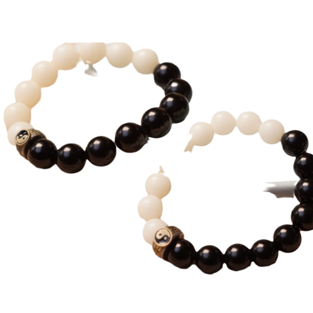 The popular white jade Bodhi and obsidian nine-character mantra handcrafted Bodhi bracelet from Taoist temples and monasteries comes in sizes ranging from 9 to 12mm Item Picture