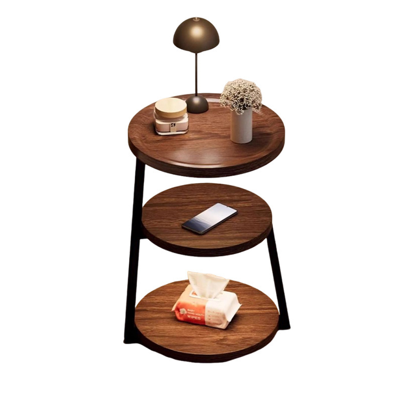 The bedside table is a small, vintage, creative round table for home use. It is a three-story bedroom bedside storage rack with a unique design sense Item Picture