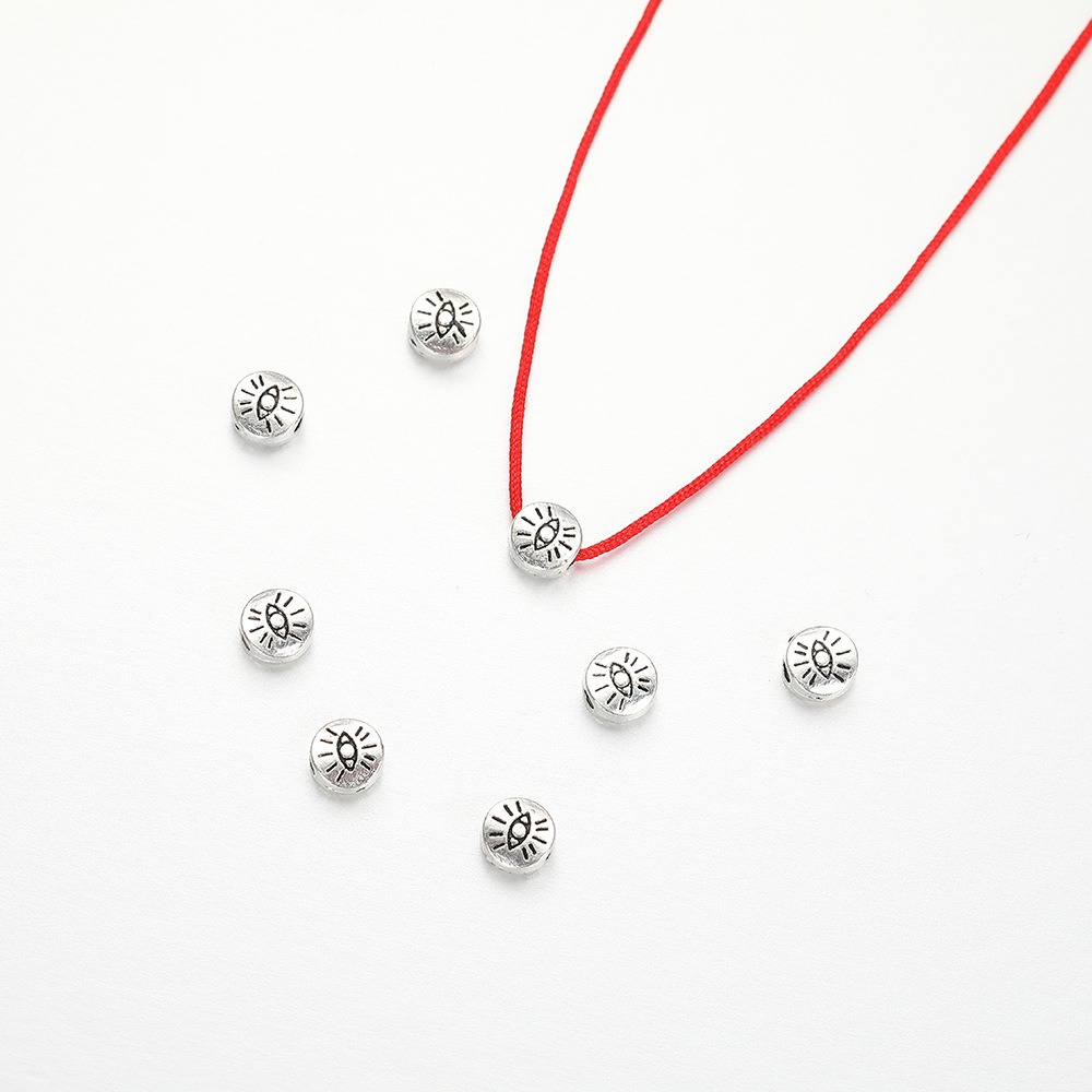Cross-border classic and personalized alloy eye flat spacer beads, retro imitation silver wholesale pendants, bracelets, necklaces, clothing accessories details Picture