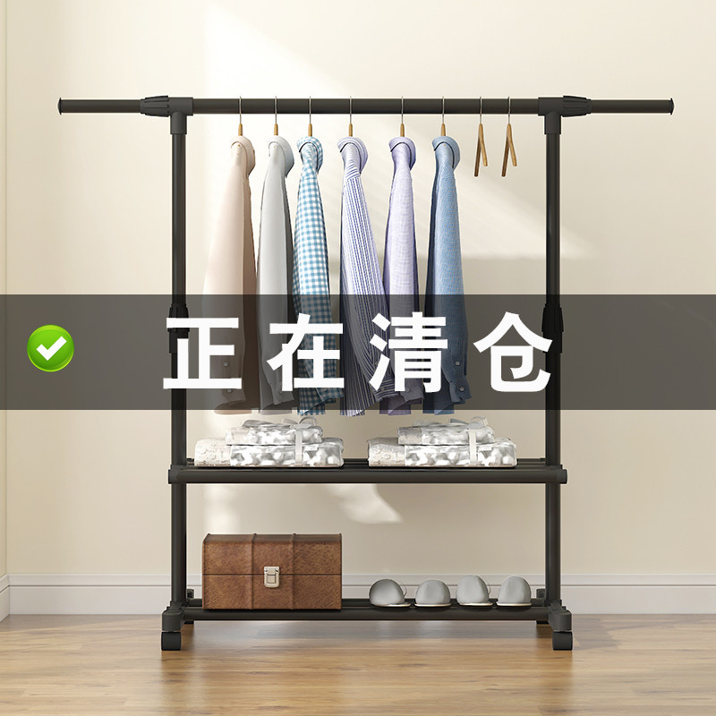 The clothes drying rack is a portable, simple double-pole indoor balcony hanging rack, a floor-standing telescopic and foldable clothes drying rack
