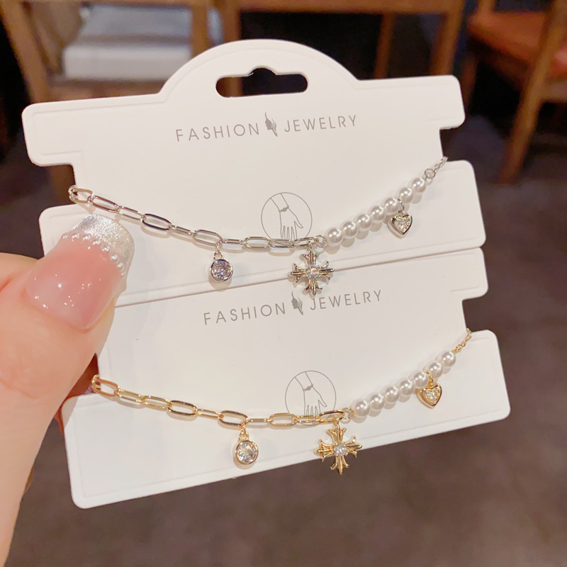 Light luxury and fashionable, versatile chain spliced pearl cross bracelet, niche style, simple design sense bracelet wholesale