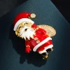 A great choice for Christmas gifts: a three-dimensional Santa Claus brooch made of copper alloy, with real gold electroplated enamel and zirconia inlaid Application Scenario