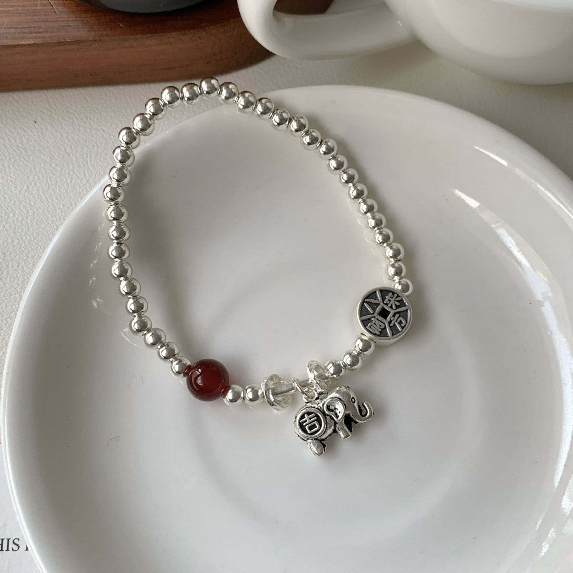 Red agate 12.4 Auspicious Elephant bracelet S925 sterling silver women's New Chinese-style Eight Directions Bringing Wealth Ethnic style elastic rope bracelet Application Scenario