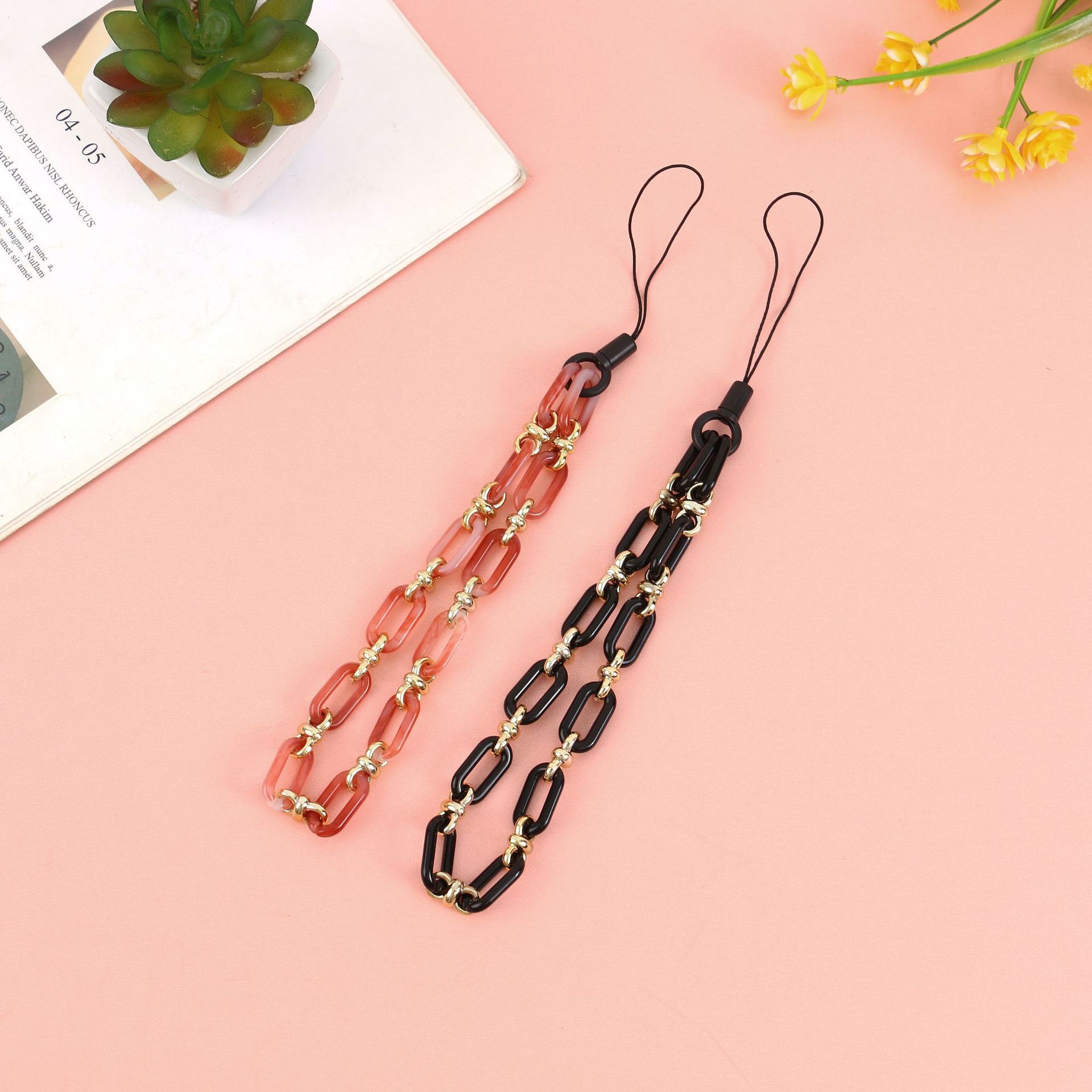 Cross-border new best-selling solid-color acrylic gold ring buckle mobile phone chain, creative mobile phone pendant, short mobile phone lanyard for women Specification image