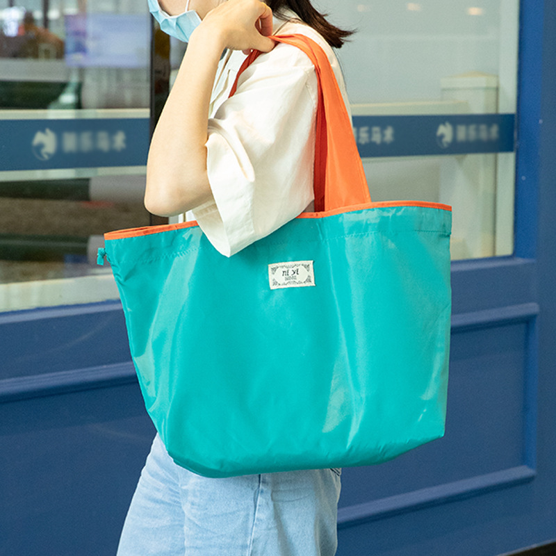 Large drawstring eco-friendly supermarket shopping bag, fashionable single-shoulder bag, foldable portable handbag, vegetable shopping bag, waterproof Application Scenario