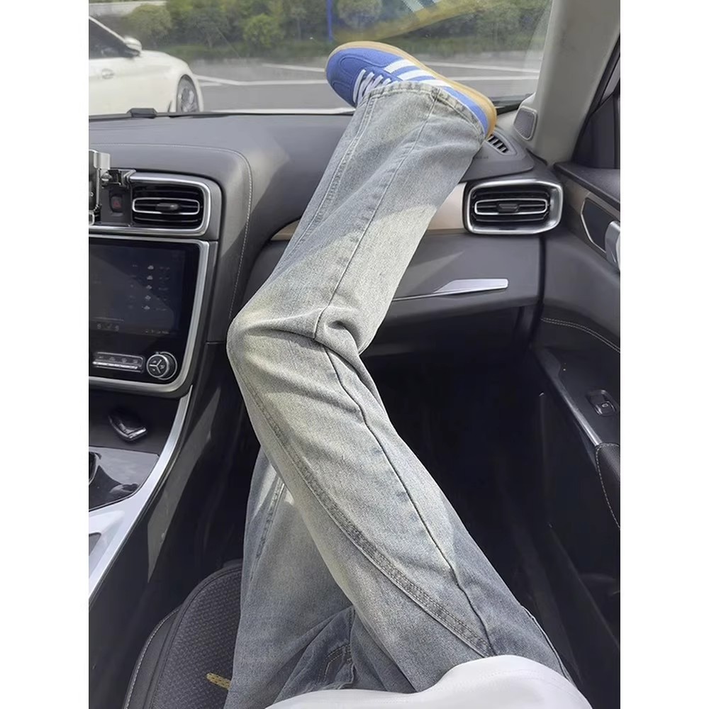 Retro blue diagonal flared jeans for men, autumn American high street vibe pants, cleanfit straight-leg curved knife pants details Picture