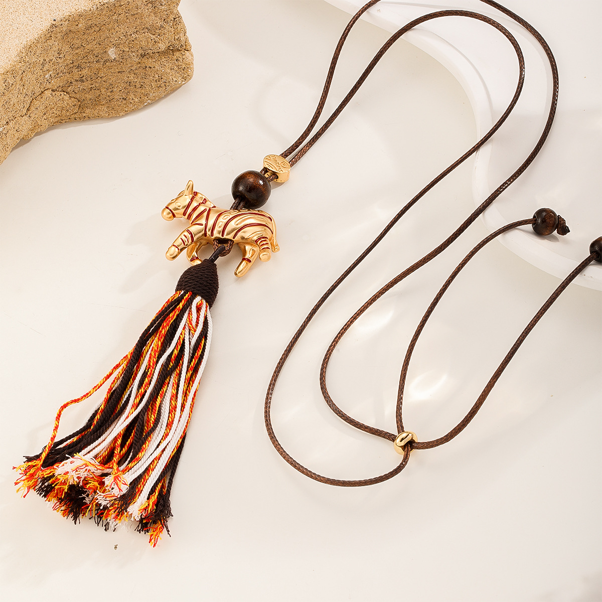 Nasha Ethnic style niche original woven rope tassel Little Horse zodiac Year sweater chain Light Luxury high-end long necklace Application Scenario