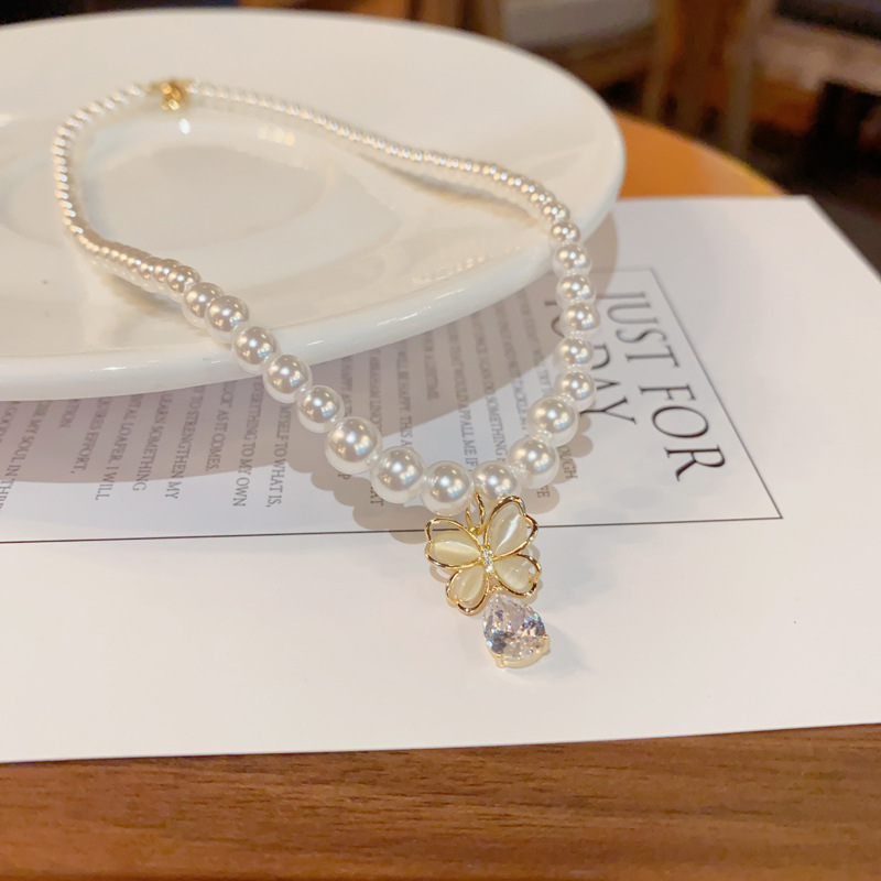 French fashion cat's eye stone butterfly teardrop-shaped pendant pearl necklace, girlish, sweet and high-end collarbone chain details Picture