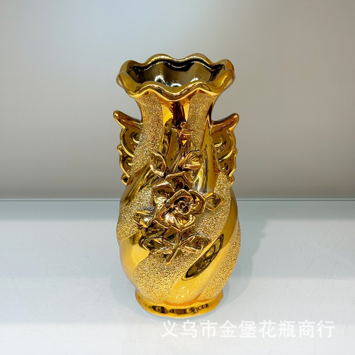 A pair of golden offering vase ceramic vases are placed in front of the 12-inch ceramic gilded Guanyin Nectar Vase Buddha Application Scenario