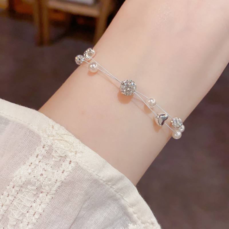 Verano nuevo lleno de diamante bola bola perla doble línea de pesca pulsera temperamento moda simple luz diseño de lujo sentido de la mano accesorios Specification image