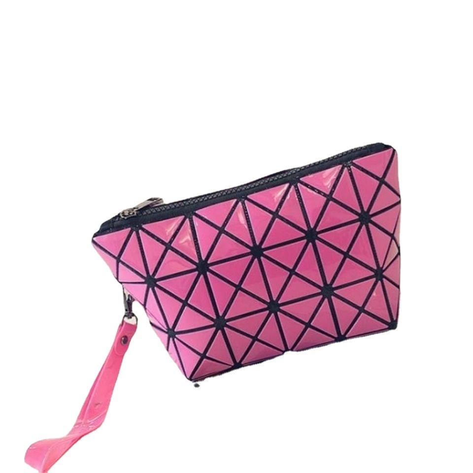 The new portable hand-held makeup bag from INS features a large-capacity travel geometric diamond-shaped versatile folding hand-held wallet for women Application Scenario