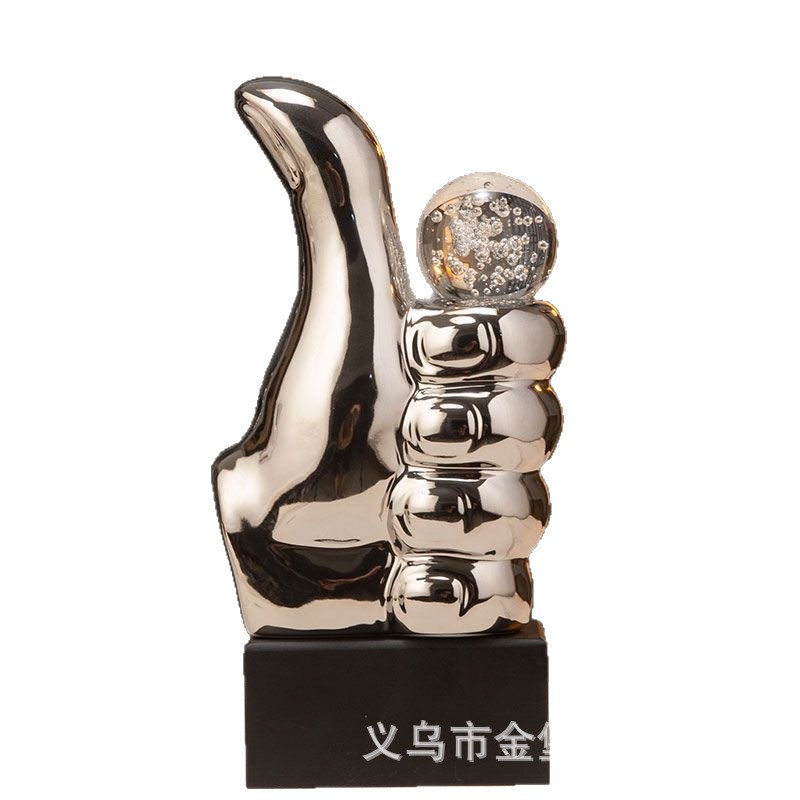 Modern electroplated thumb resin sculpture boss table, inspiring decoration, housewarming business gift, home furnishing supply Application Scenario