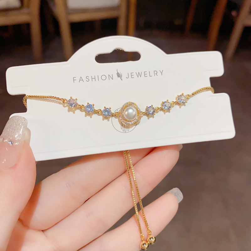 Japanese and Korean style fashionable, light luxury, niche zircon wrapped pearl bracelet for women, high-end design sense, versatile jewelry wholesale Specification image