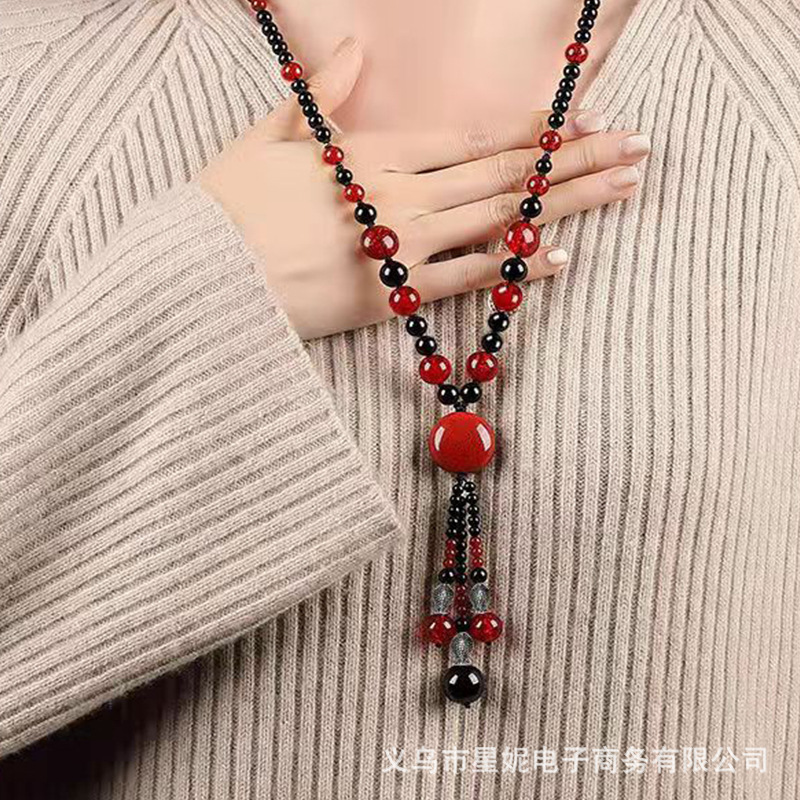 Wholesale of new "Yearly Fish" long agate necklace, retro ethnic style decorative sweater chain, pendant and accessory