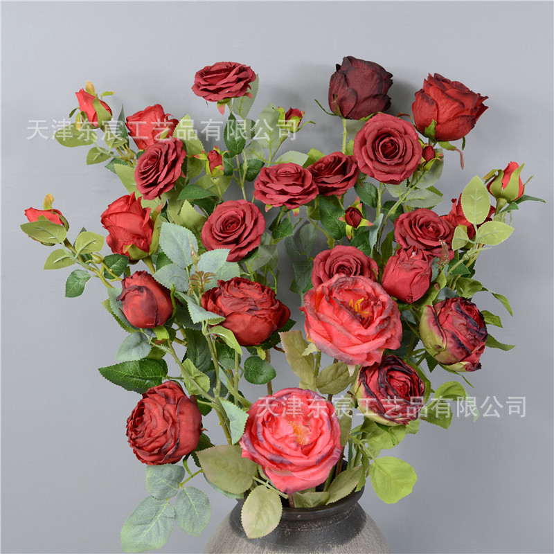 The scene decoration of the birthday banquet with bright red flower materials, the arrangement of the Chinese-style wedding hall, the New Year's Eve flowers, and the flower arrangement of the money bucket Application Scenario