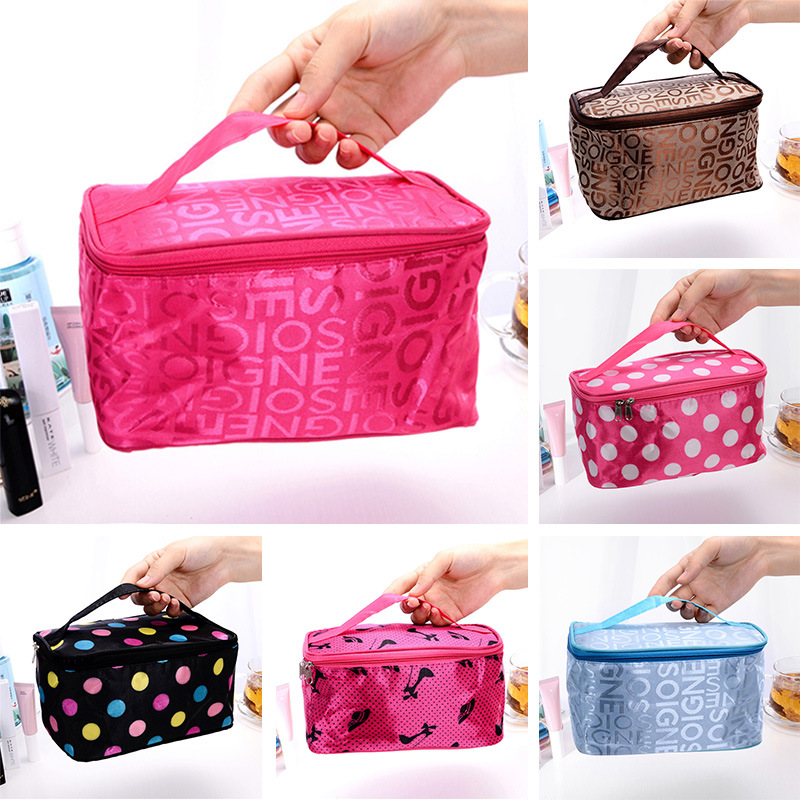 A new best-selling women's hand-held cosmetic bag, a colorful and fashionable women's lettered travel hand-held storage toiletry bag