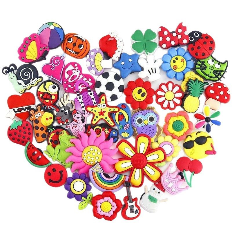 跨境洞洞鞋鞋扣鞋花鞋配件卡扣PVC滴塑软胶鞋花卡通沙滩鞋鞋带白底实物图