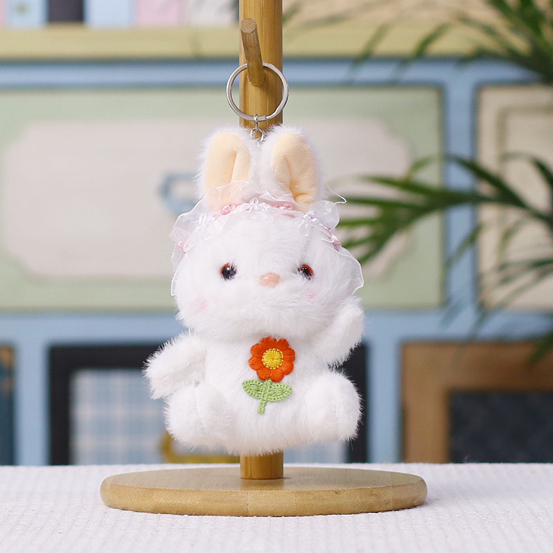 Cartoon headscarf, flower-hugging rabbit pendant, cute plush toy doll, bag, hanging decoration, doll, keychain, doll details Picture