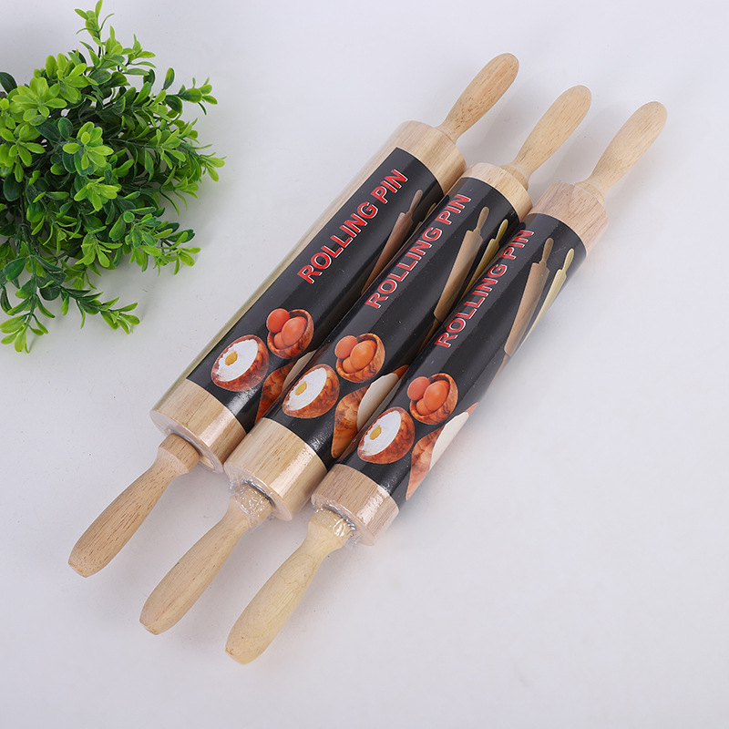 During the Spring Festival, the whole family makes dumplings with solid wood rolling pins, non-stick rolling rollers, and household rolling pins in stock for wholesale During the Spring Festival, the whole family makes dumplings with solid wood rolling pins, non-stick rolling rollers, and household rolling pins in stock for wholesale