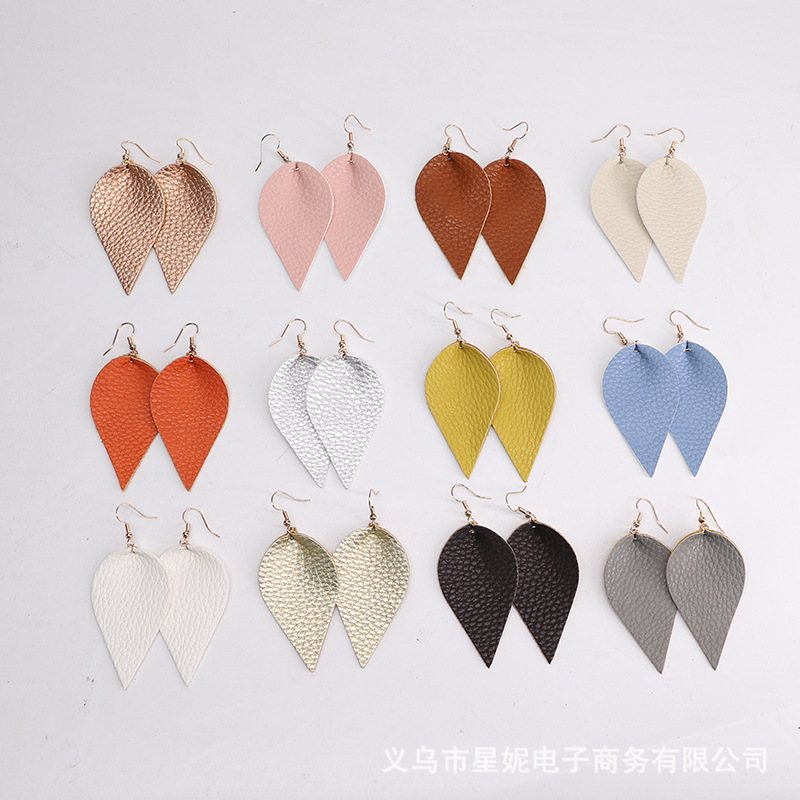 Fine-grained pu leather leaf style earrings, popular in Europe and America. Simple and exquisite pu leather leaf earrings, cross-border e-commerce supply