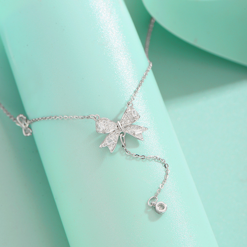 925 silver necklace, women's niche national trend, full diamond tassels, elegant and individual, bow pendant, collarbone chain accessory wholesale Application Scenario