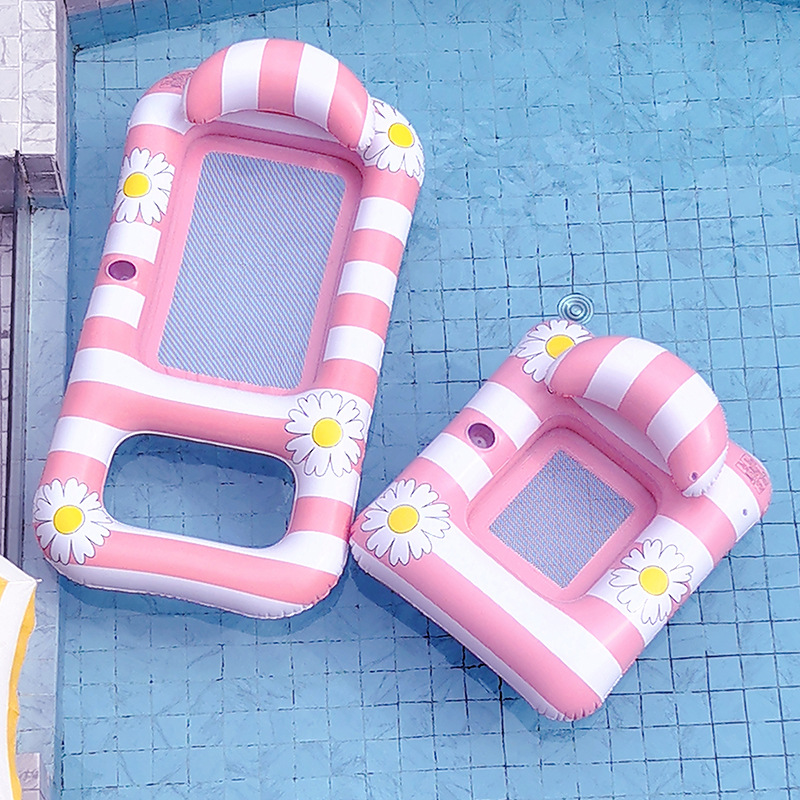 A water lounge chair with a retro striped floral print backrest that has become a popular adult, a floating bed with a cup of water and a drink details Picture