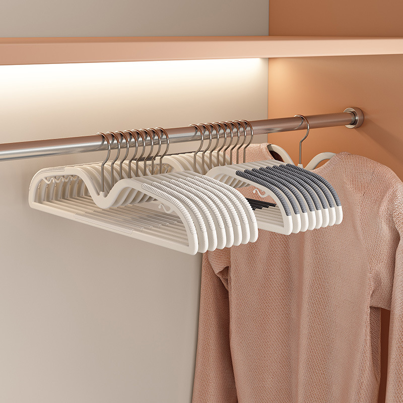 Anti-slip and traceless clothes hanger, home wardrobe with a shortened neck, short anti-shoulder corner, and a rotatable clothes drying rack. Modern style details Picture