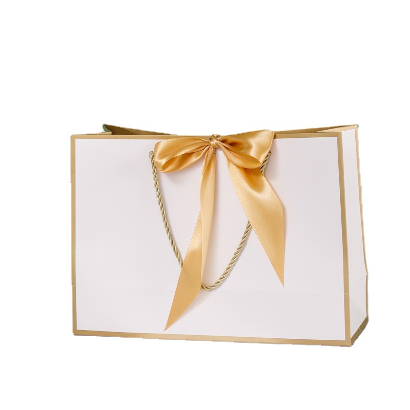 En stock bolsa de regalo de papel de tarjeta blanca arco bolsa de papel portátil tienda de ropa bolsa de compras fabricante al por mayor logotipo imprimible Item Picture