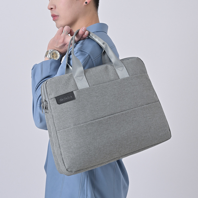 男士手提包横款简约笔记本电脑包商务通勤公文包大容量潮搭休闲包
