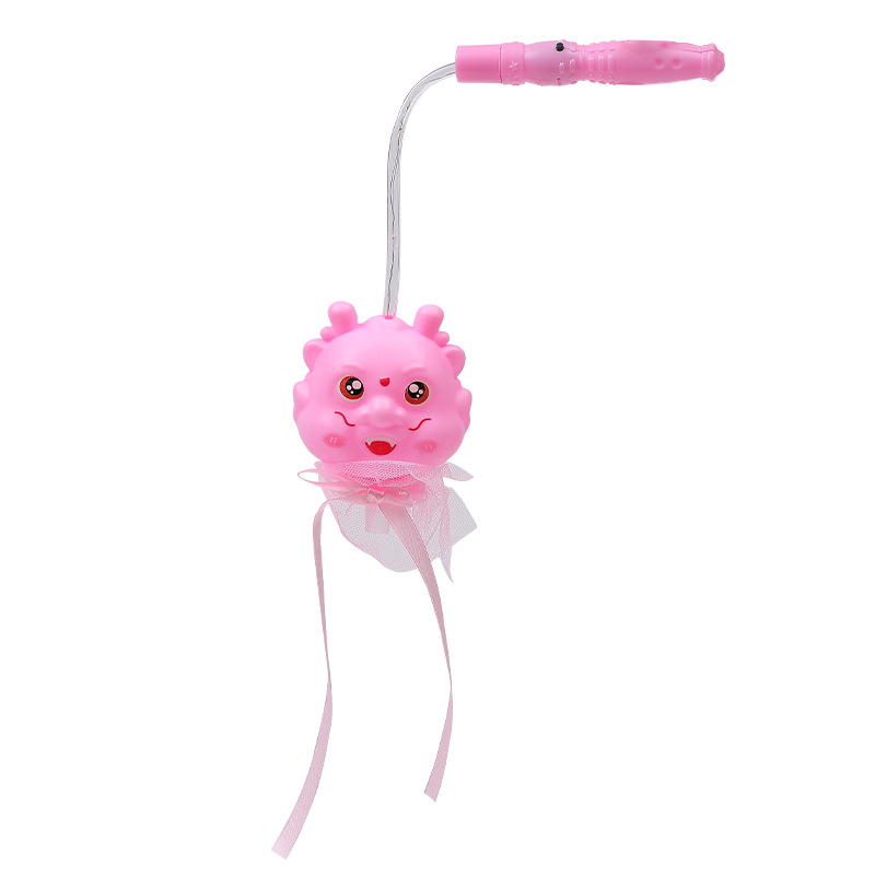 New hand-held lanterns for the Year of the Dragon 2024, featuring little dragon figures, children's luminous toys and flashing lanterns, are available for wholesale at night market stalls Item Picture