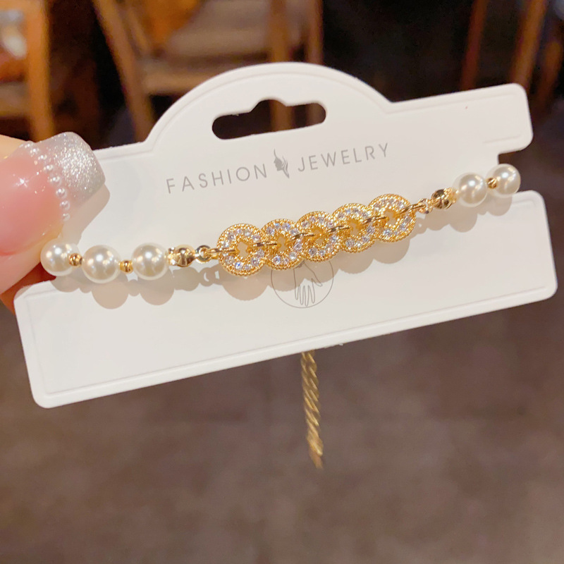 Nuevo China circonitas de cobre dinero perlas pulsera de perlas ligero lujo alto sentido de la cadena de mano temperamento versátil moda mano accesorios al por mayor details Picture
