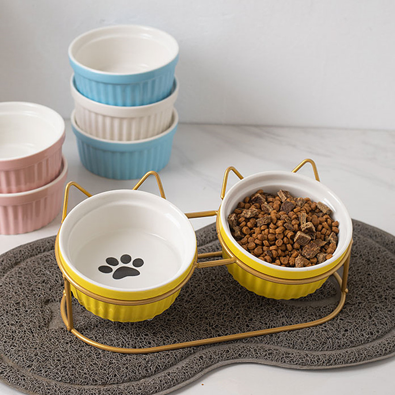 The intelligent cat bowl rack, a pet product, is a special automatic feeder for cats with adjustable height and anti-tipping design details Picture