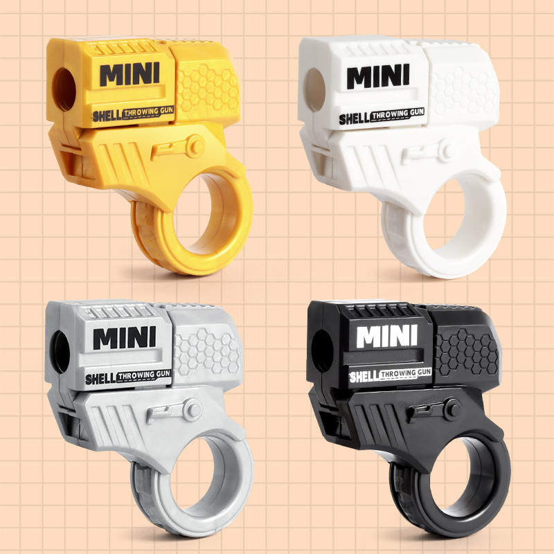 Factory wholesale cross-border best-selling mini finger stress-relieving ring rotating gun, cool and capable of firing shell-throwing toys for boys