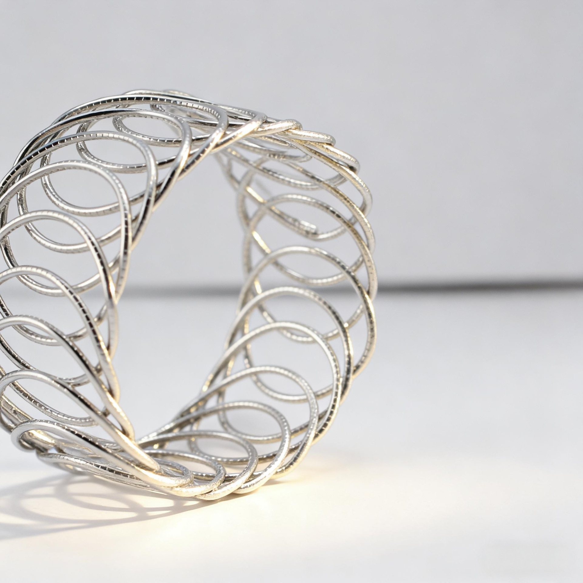 The metal hollowed-out bracelet ring of the same style as AM from Europe and America, with a unique cross-border personality Specification image