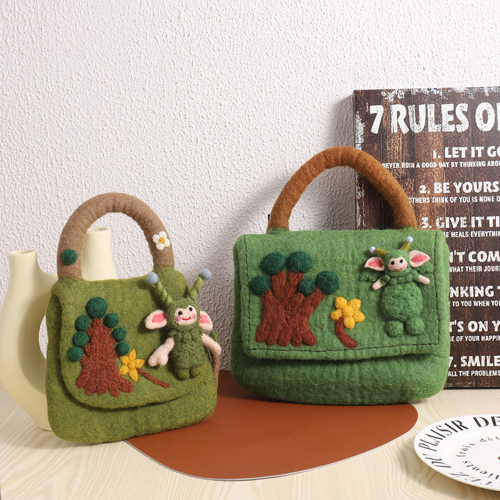 森系羊毛毡包包尼泊尔手工羊毛毡手拿包小众精致羊毛毡手提包批发