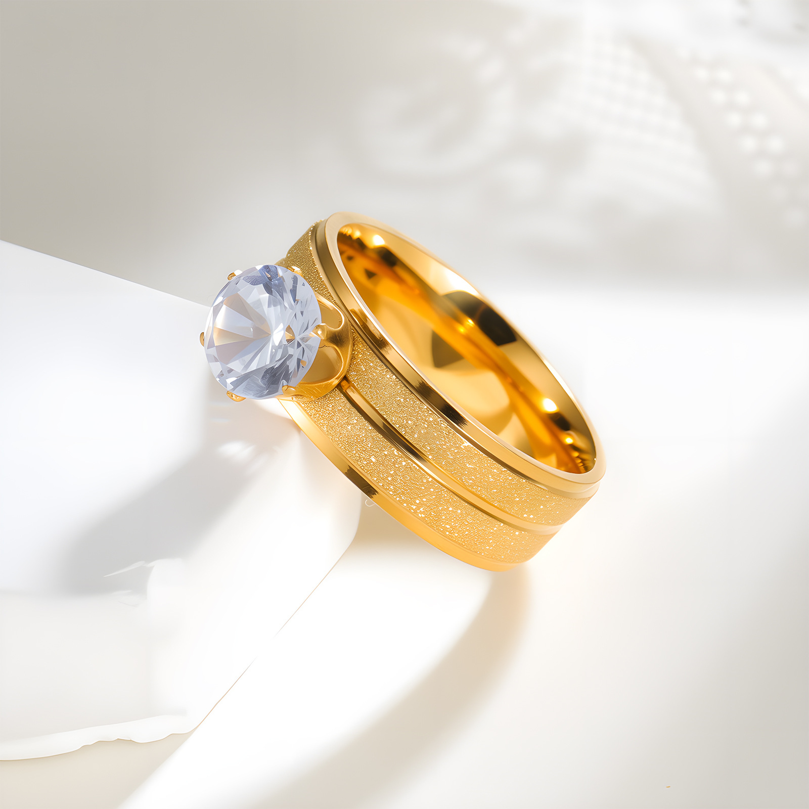 Cross-border European and American stainless steel jewelry, six-prong zircon women's ring, stainless steel electroplated with gold matte finish, 8MM wide