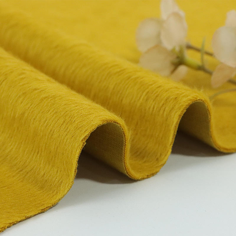 柯桥仿棉涤不倒绒针织面料秋冬弹力素色不倒绒保暖内衣裤服装面料细节图