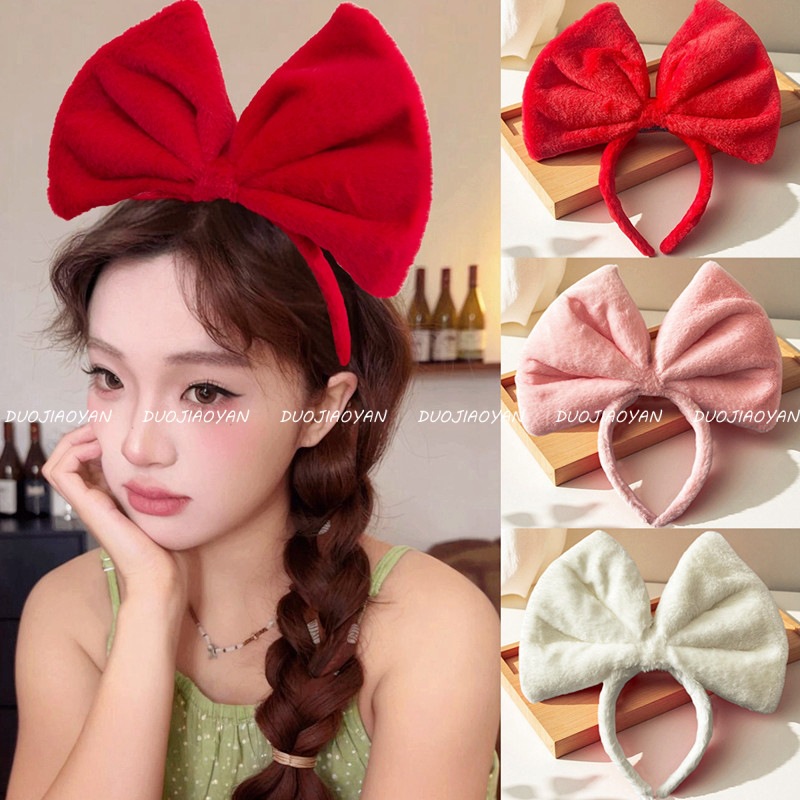 A super large three-dimensional plush high skull top bow headband with a sweet atmosphere, a high-end hair accessory for travel photos full figure