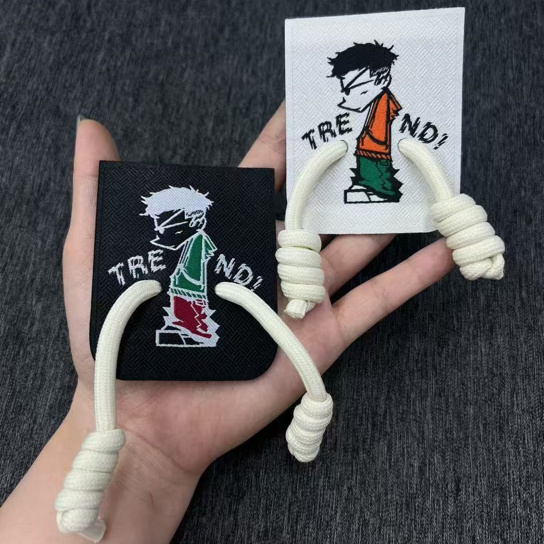 Wholesale of new trendy original cartoon patchwork clothing accessories, children's clothing, bags, decorative trademarks, cute woven labels, and fabric labels Application Scenario