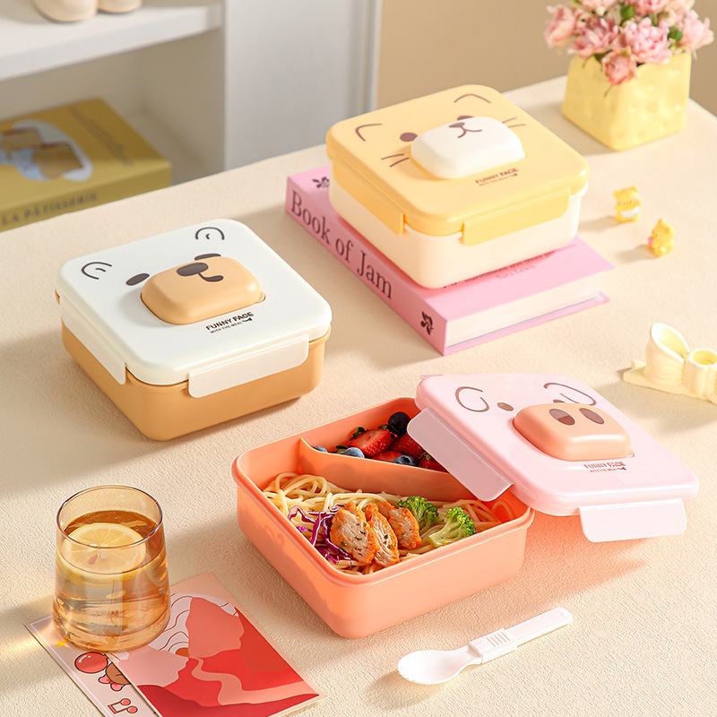 Cute compartments student lunch box that can be heated in a microwave oven. Home cartoon bento box. Office worker lunch box with tableware details Picture