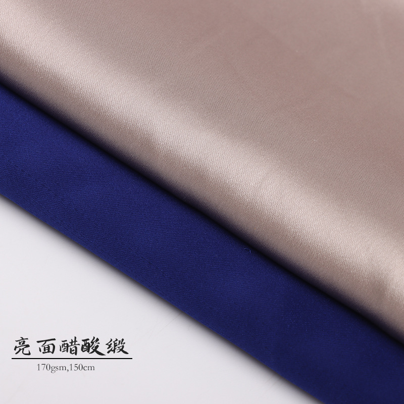 现货全涤亮面缎时装醋酸面料女装吊带连衣裙小衫睡衣布料白底实物图