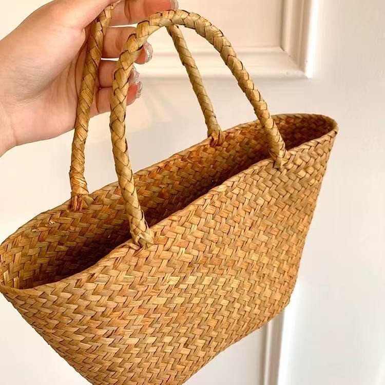 网红款编织手提包小众女包旅游度假小清新凹造型手工草编收纳产品图
