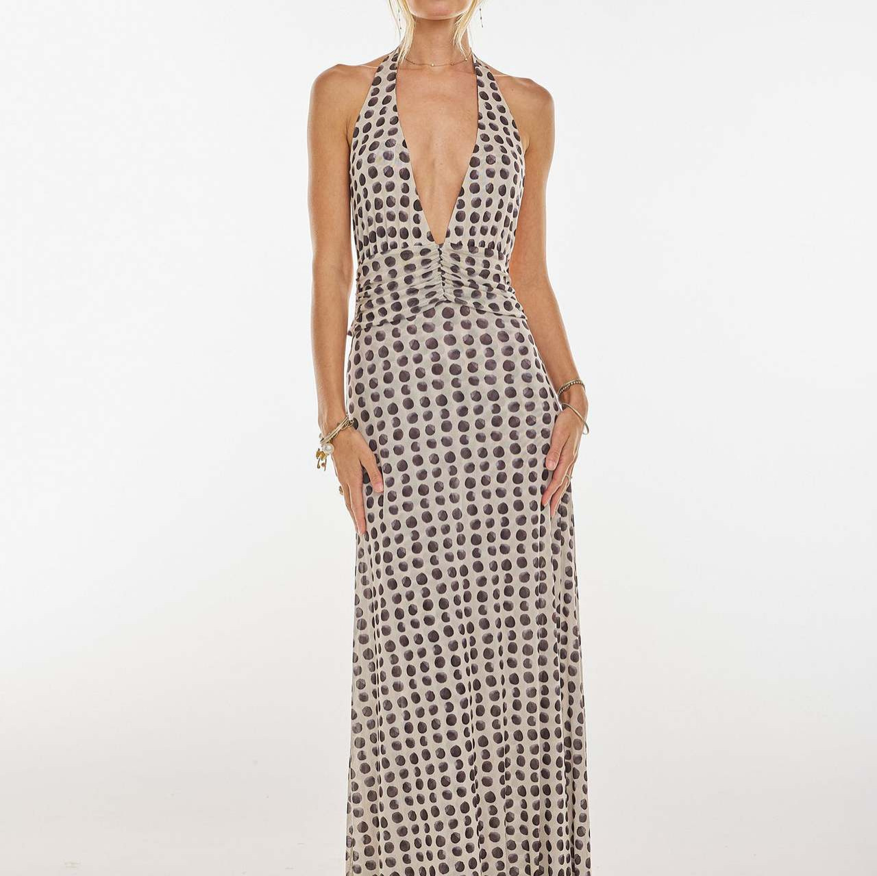 A new, fashionable and sexy spring and summer dress in the style of European and American ins, featuring a backless, figure-hugging printed halter dress full figure