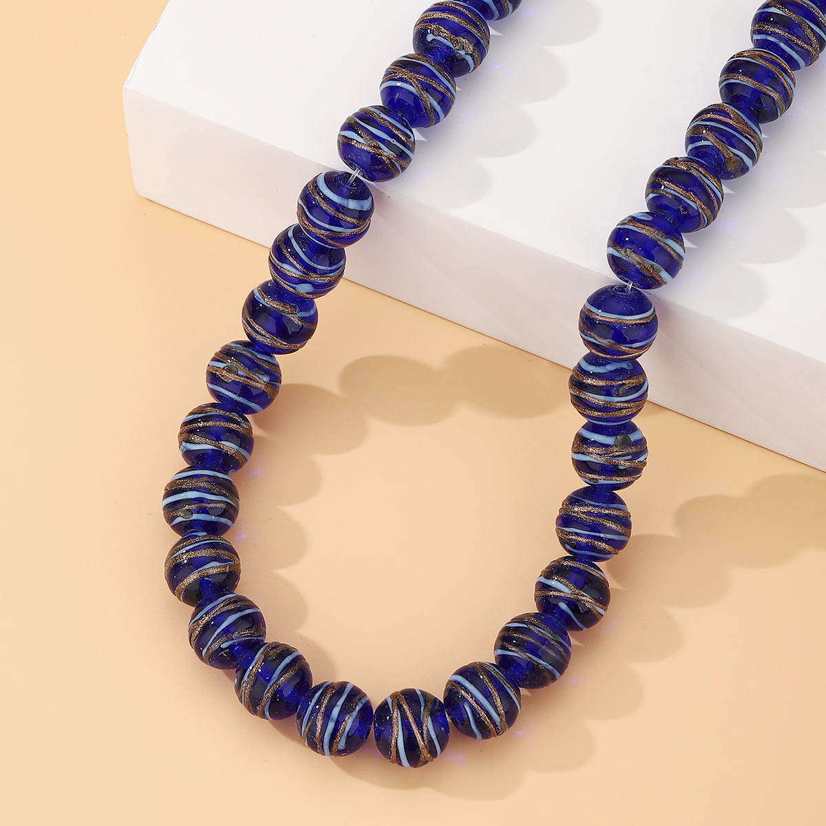 Wholesale of handcrafted DIY beaded jewelry accessories, flat beads, wheel beads, gold wire double-color dispersion beads, necklaces, bracelets and glass details Picture