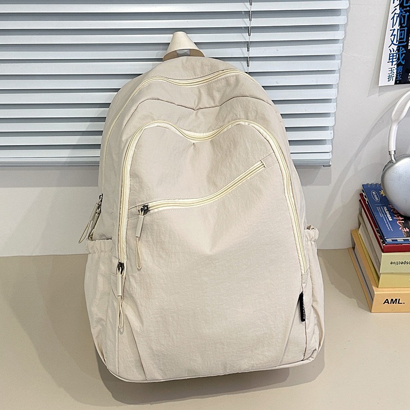 Cross-border fashionable and simple women's backpack, high-end, lightweight and casual travel men's backpack, large-capacity student schoolbag Item Picture