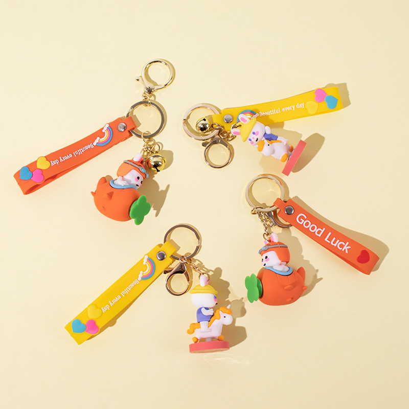Couple carousel Rabbit Year keychain, Little Rabbit flying bag pendant, creative silicone keychain manufacturer wholesale Application Scenario