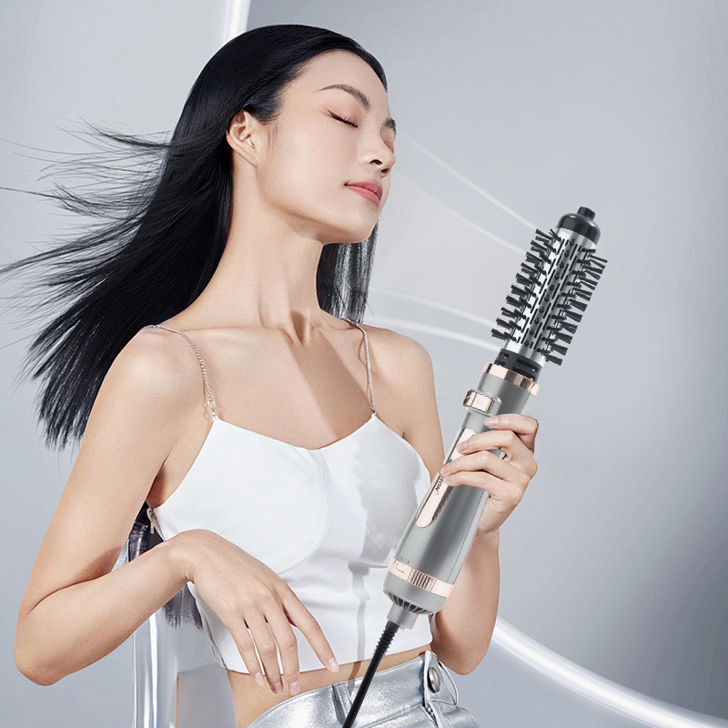 The manufacturer wholesals multi-functional curling and straightening dual-purpose hot air combs, two-in-one curling irons, and fully automatic air-blowing combs that are selling well across borders details Picture