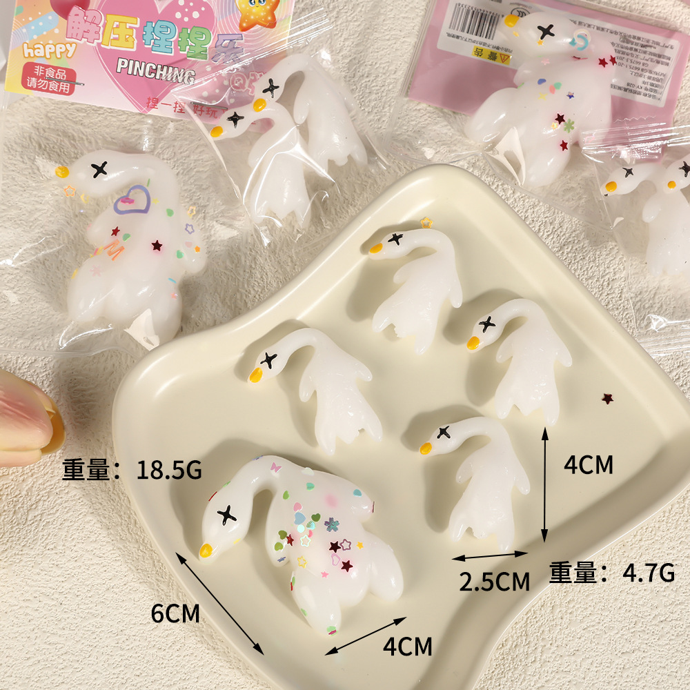 The popular and trendy roast duck "Pinching Fun" mini stress-relieving simulation food and play toys are set up at the night market to relieve stress