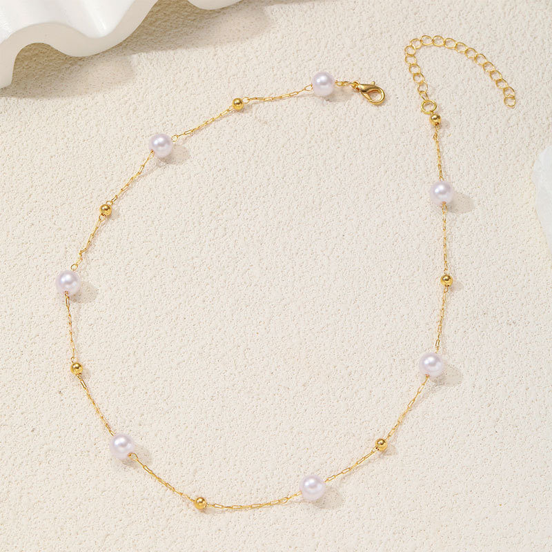 A popular cross-border pearl-like necklace for women in Europe and America, featuring a simple, fashionable and cold style. It is a metal ball necklace accessory for women in summer Application Scenario