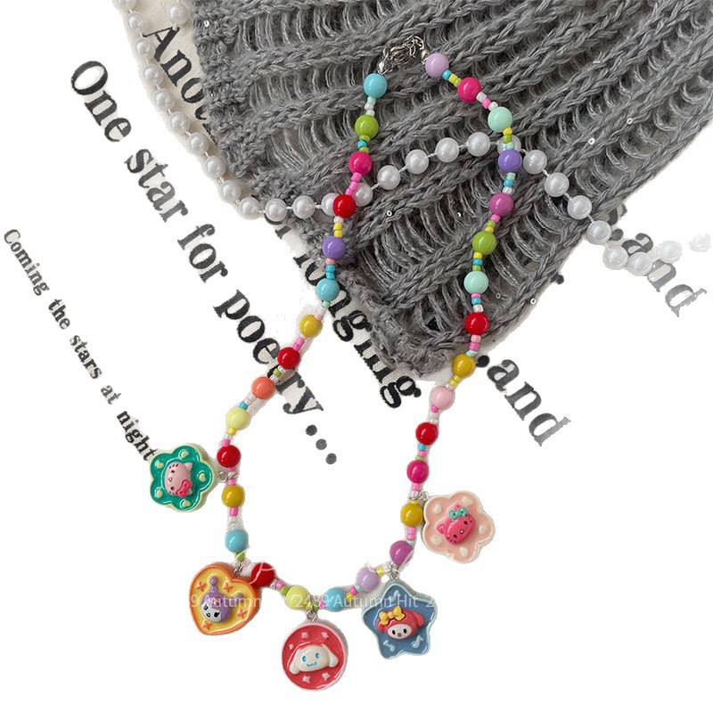 新款韩系卡通彩色珠珠项链手作儿童树脂草莓女孩挂脖饰品配饰趣萌女多彩串珠卡通形象吊坠项链 童系 多款可爱造型少女心装饰颈白底实物图